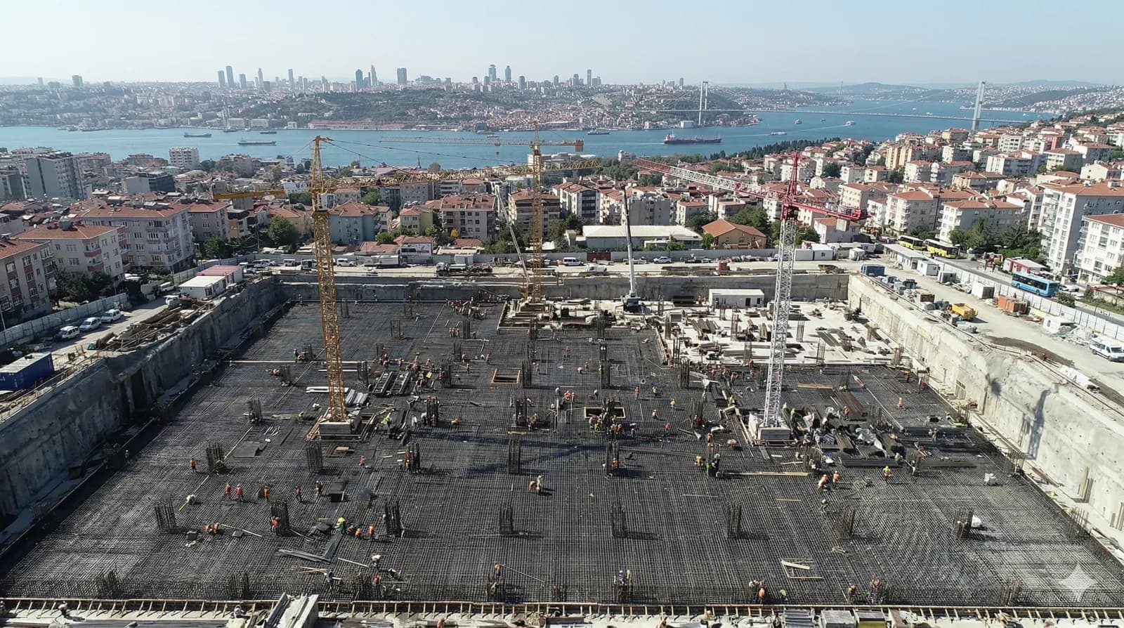 Aerial view of a reinforced concrete raft foundation under construction in Istanbul